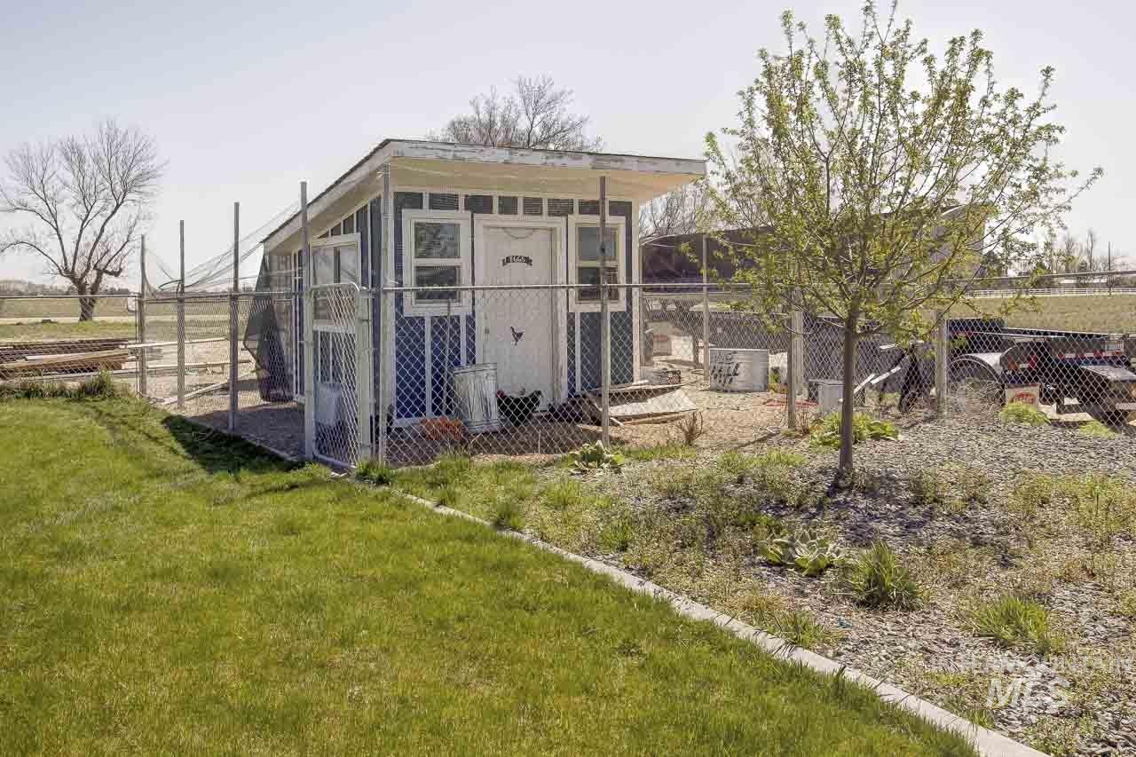 View of outbuilding with a sunroom