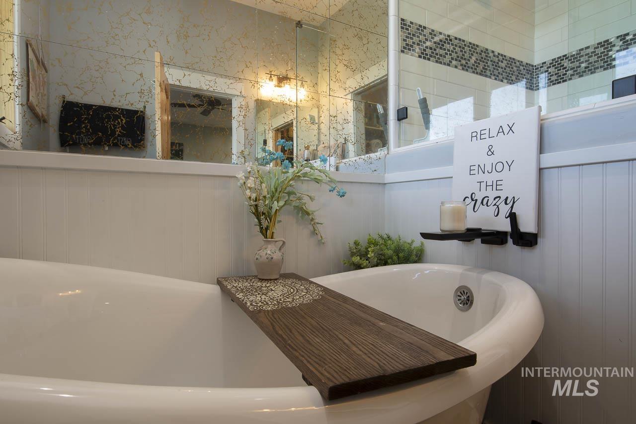 Bathroom featuring a soaking tub