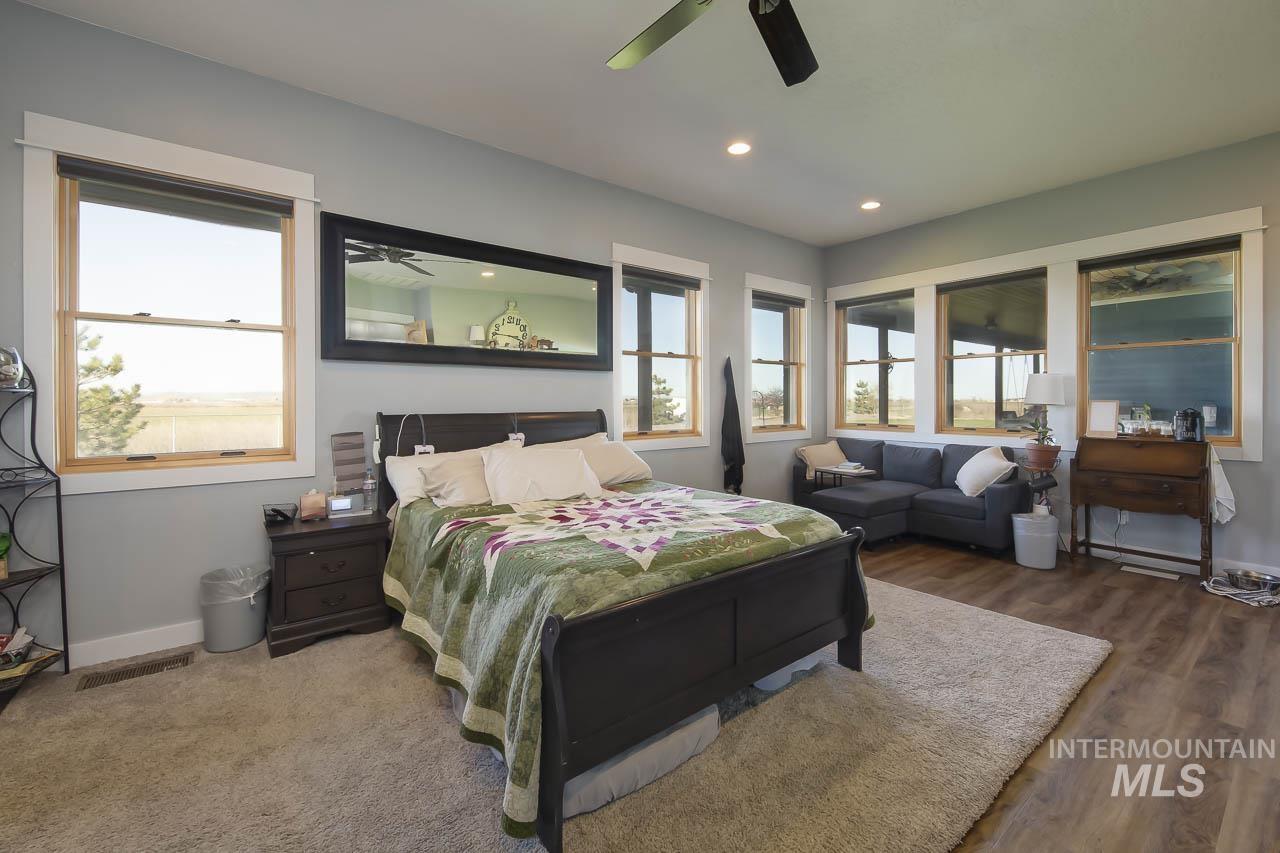 Bedroom featuring recessed lighting and ceiling fan