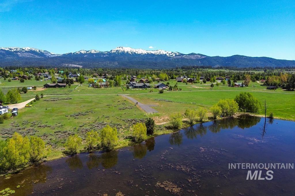 Aerial view of residential area with a water and mountain view