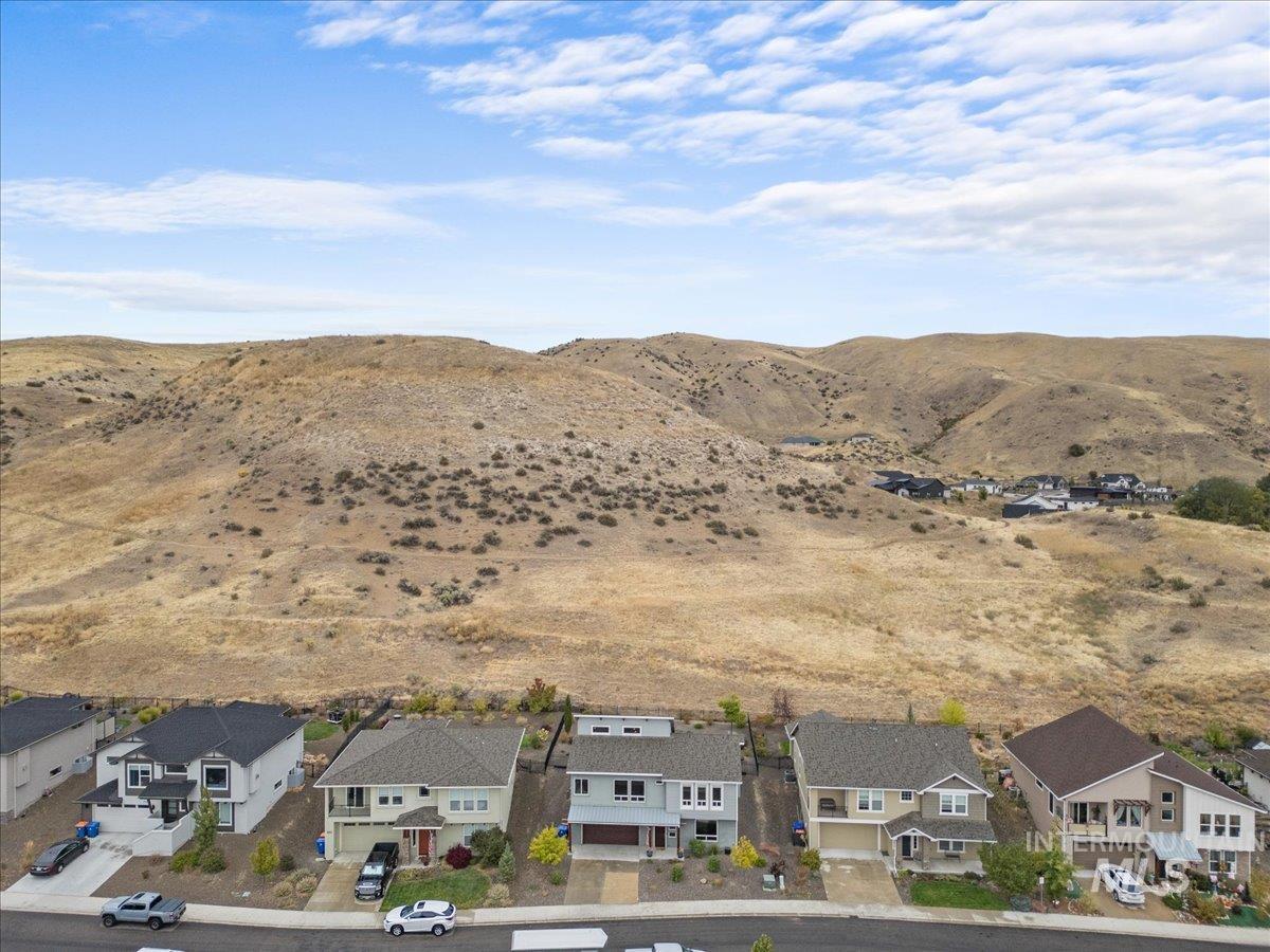 Aerial perspective of suburban area with mountains