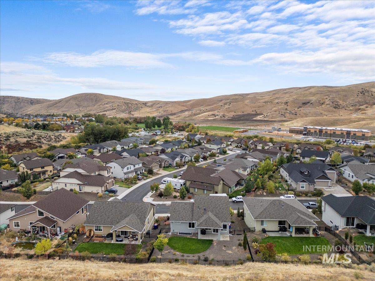 Aerial view of residential area with mountains