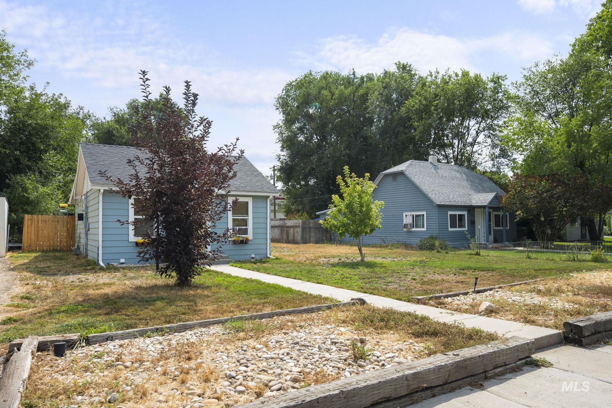 View of property exterior featuring roof with shingles