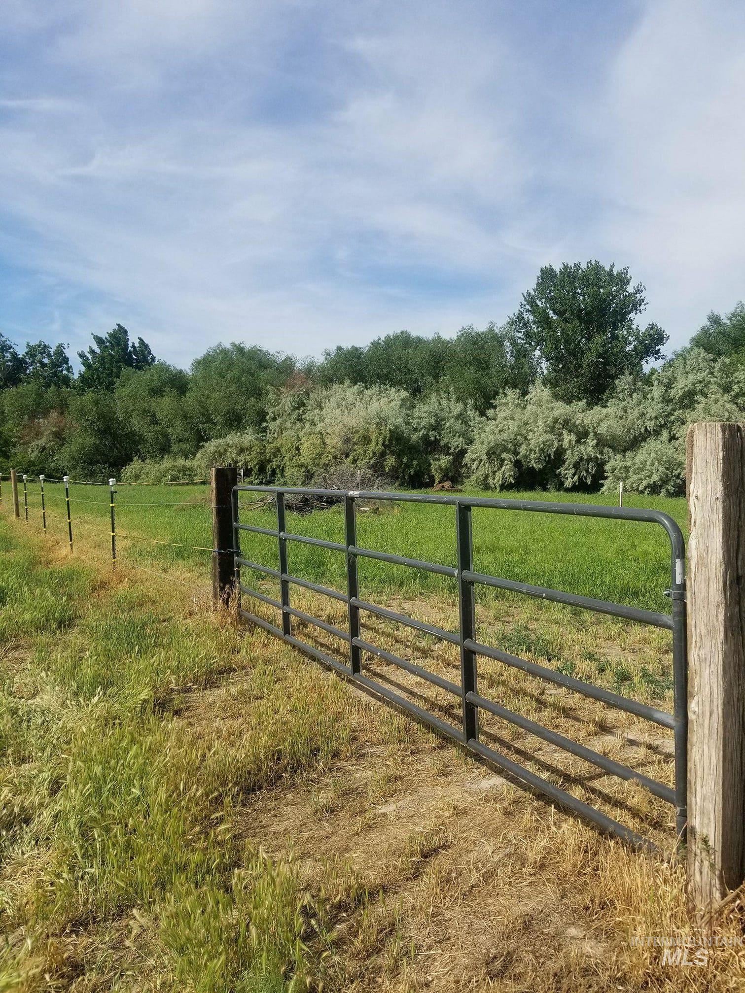 Gate featuring a rural view