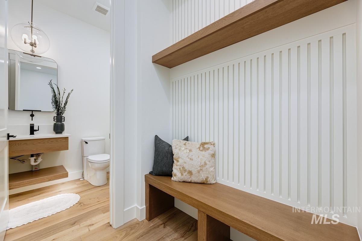 Mudroom featuring wood finished floors
