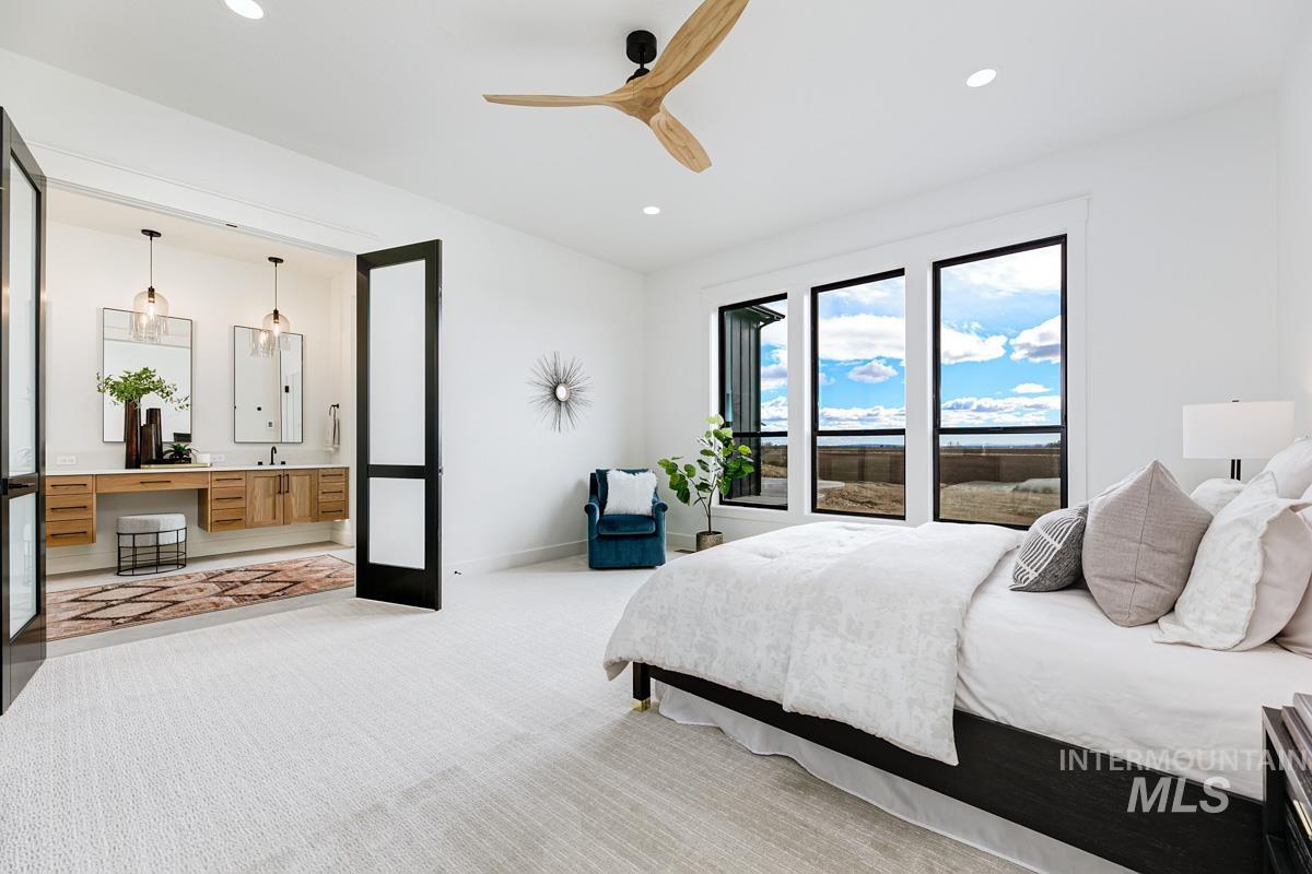 Bedroom with carpet flooring, recessed lighting, and ceiling fan