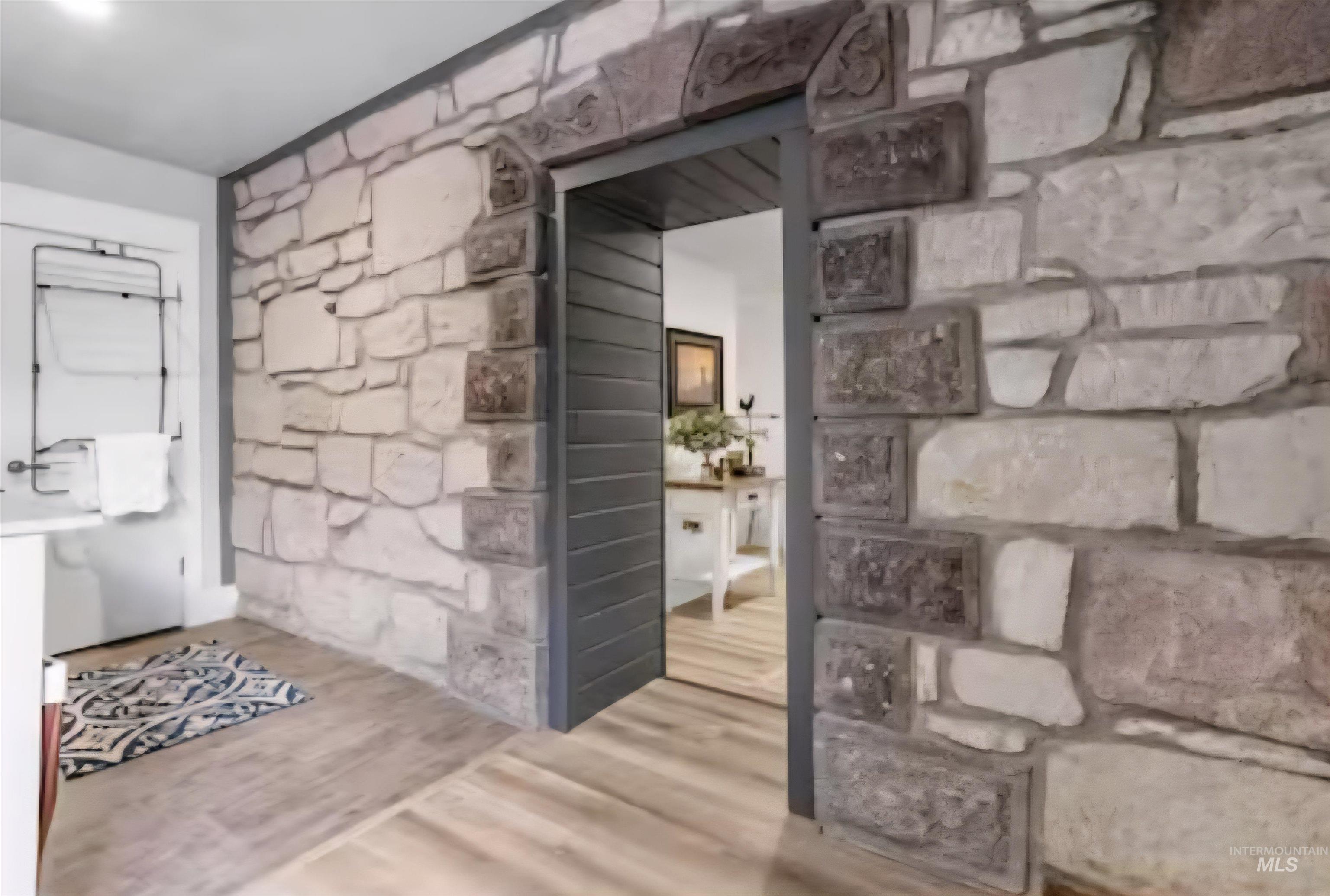 Wine area with wood finished floors