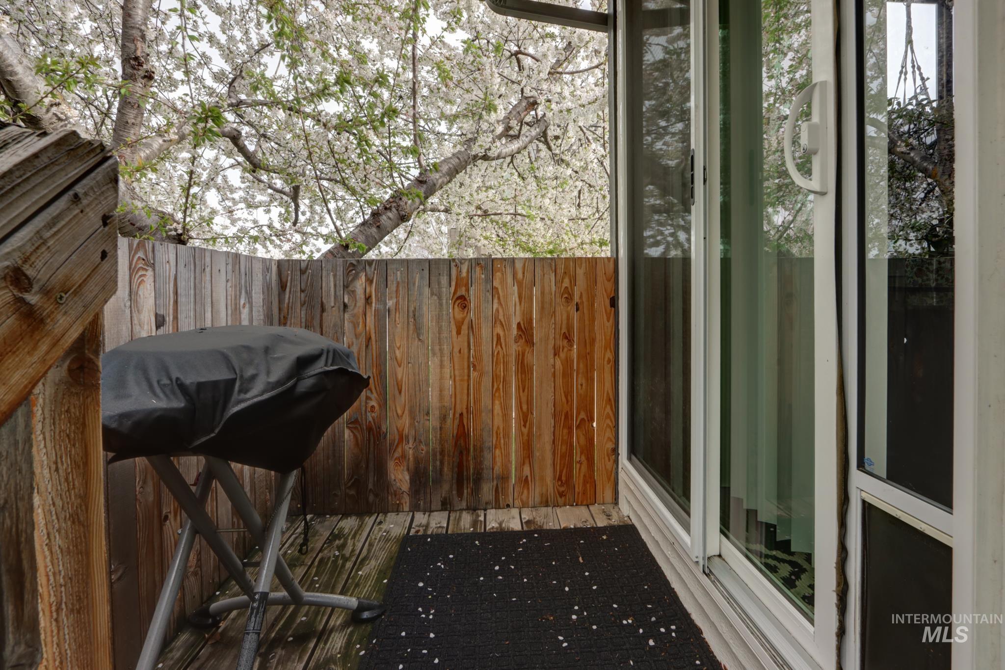 View of patio / terrace with area for grilling and a deck