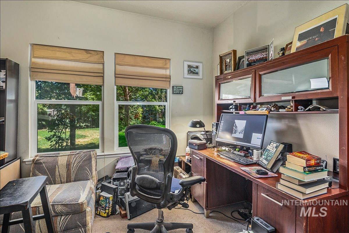 Office space with light colored carpet