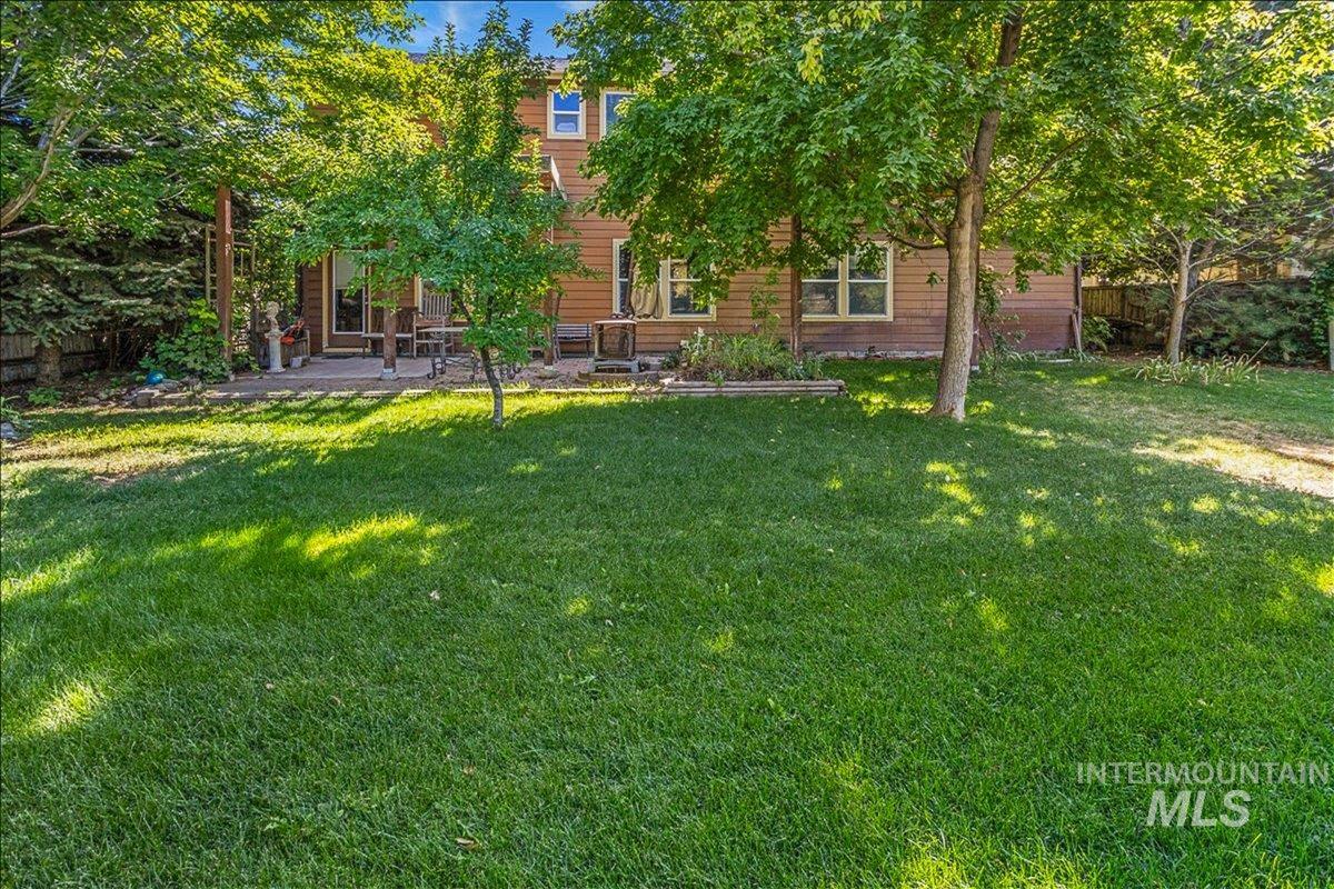 View of yard with a patio