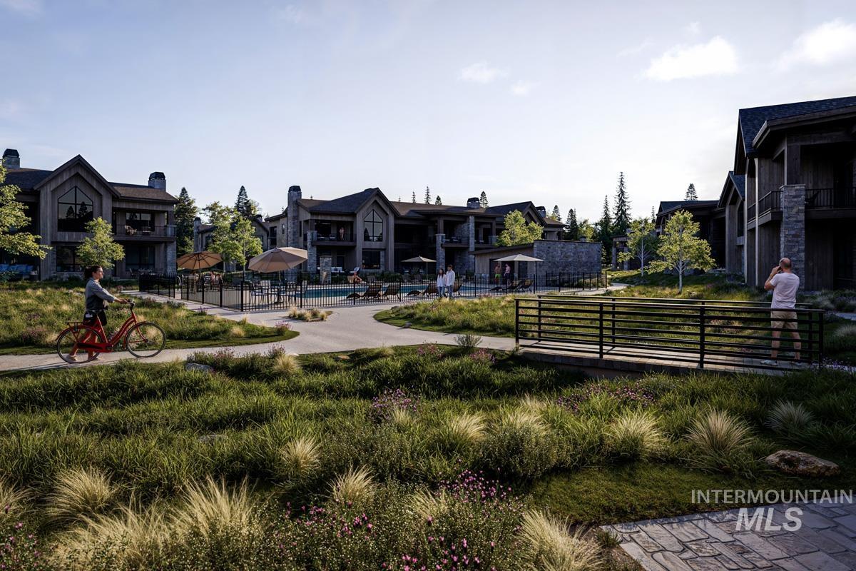 View of property's community featuring a pool and a residential view
