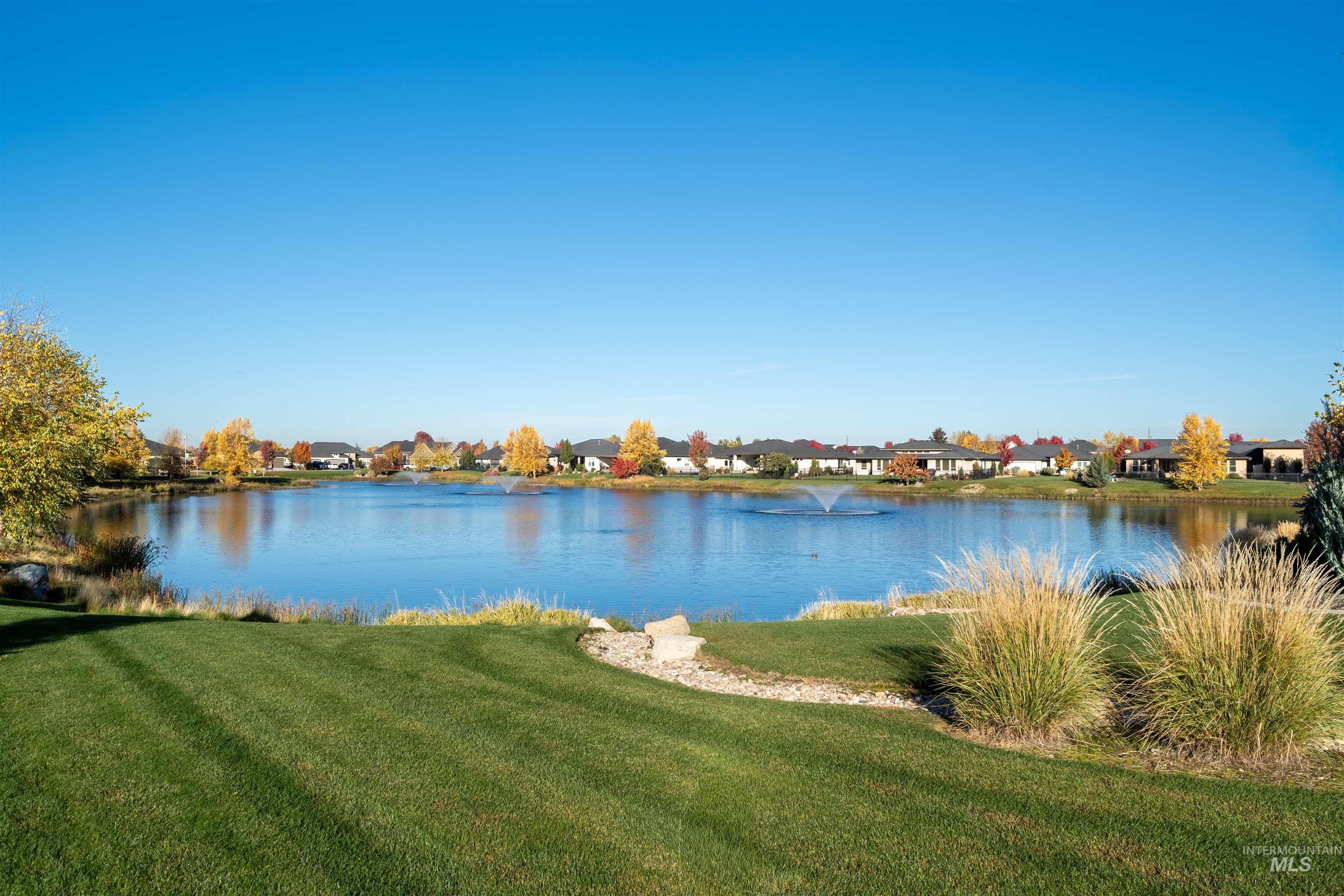 Water view with nearby suburban area
