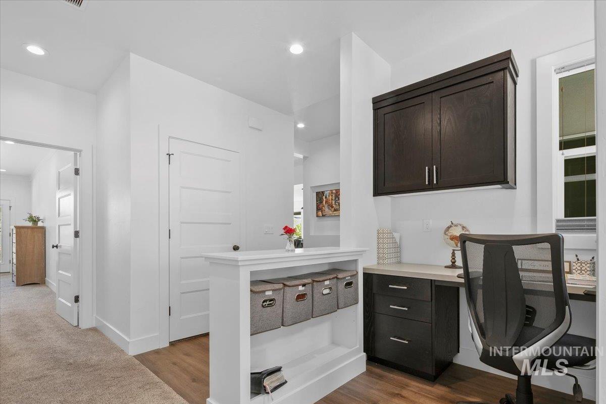 Office featuring recessed lighting and light wood-type flooring