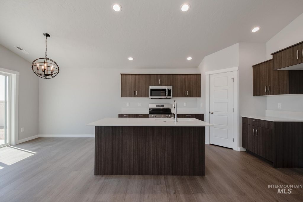 Photo of 15318 Queensbury Ave, Nampa, ID 83651 (MLS # 98979368)