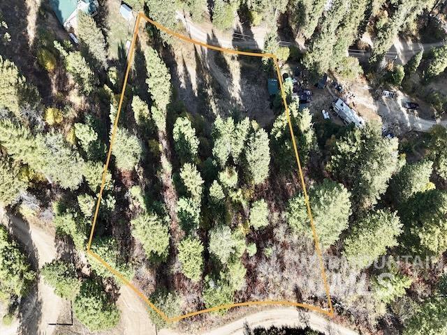 Aerial overview of property's location featuring property parcel outlined