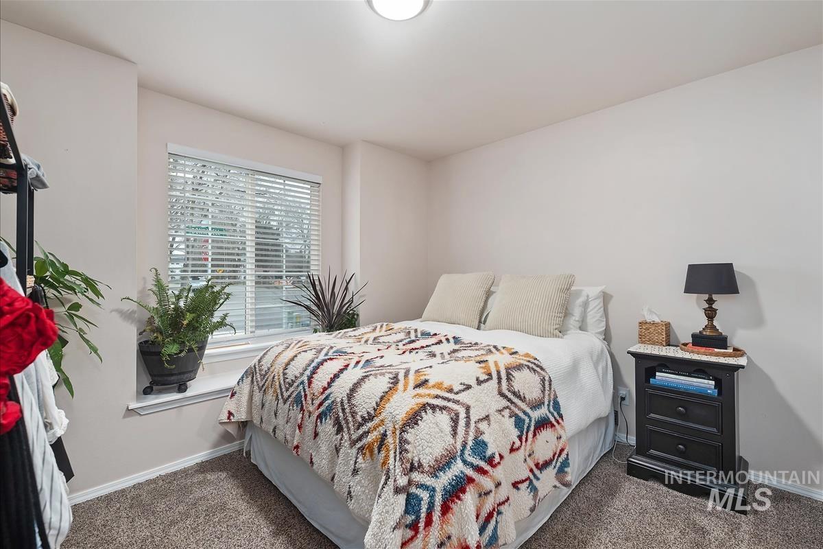 Bedroom featuring carpet