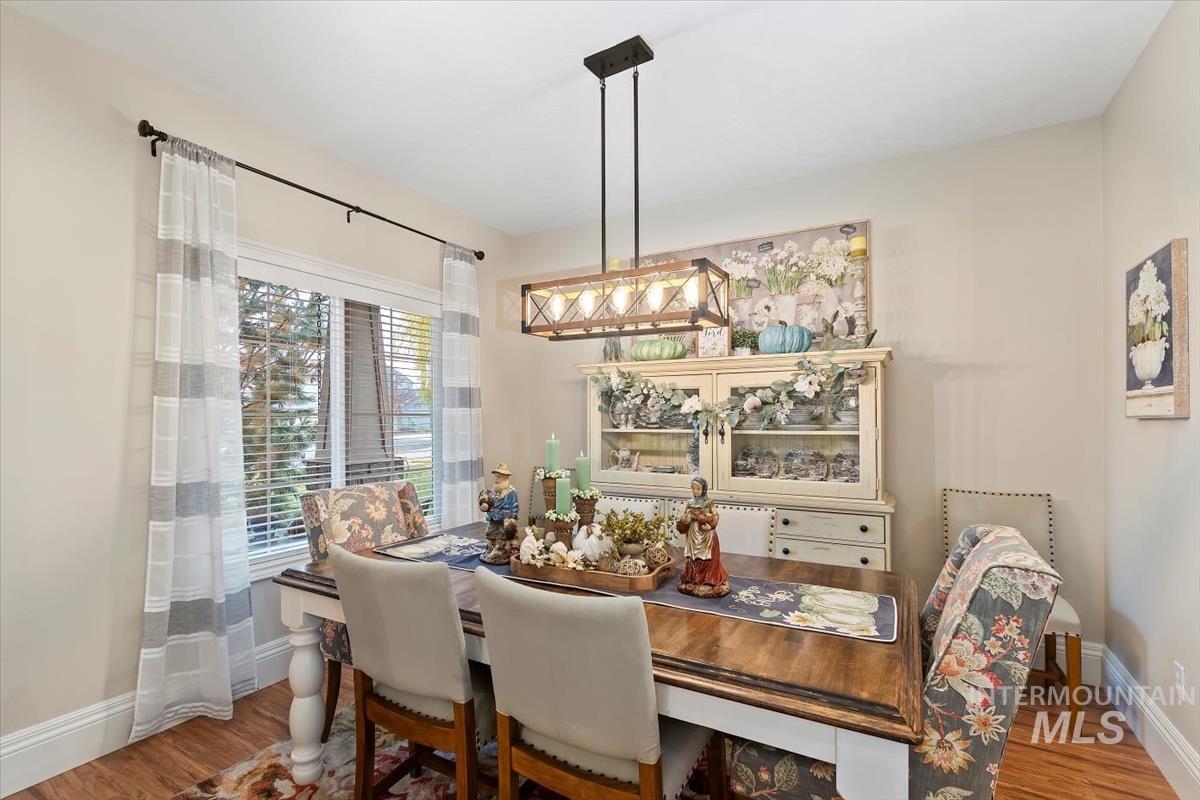 Dining room with wood finished floors