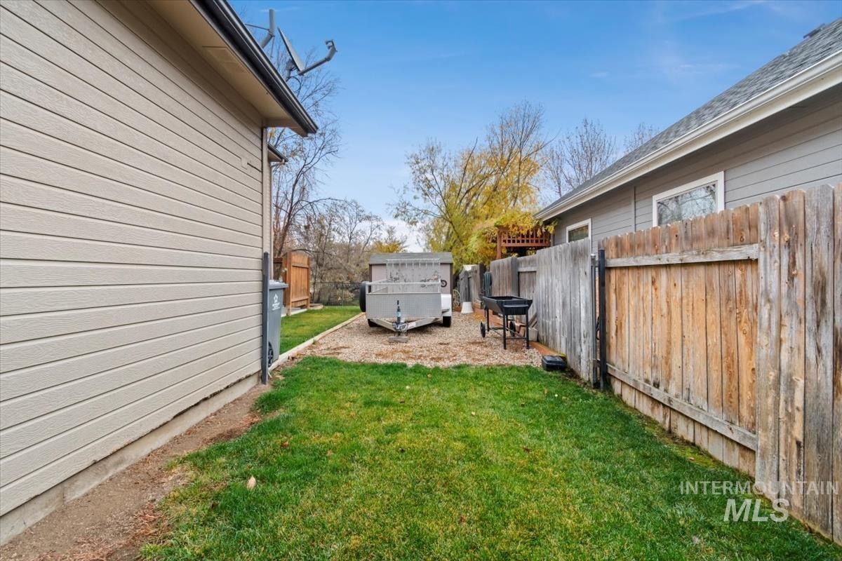 View of fenced backyard