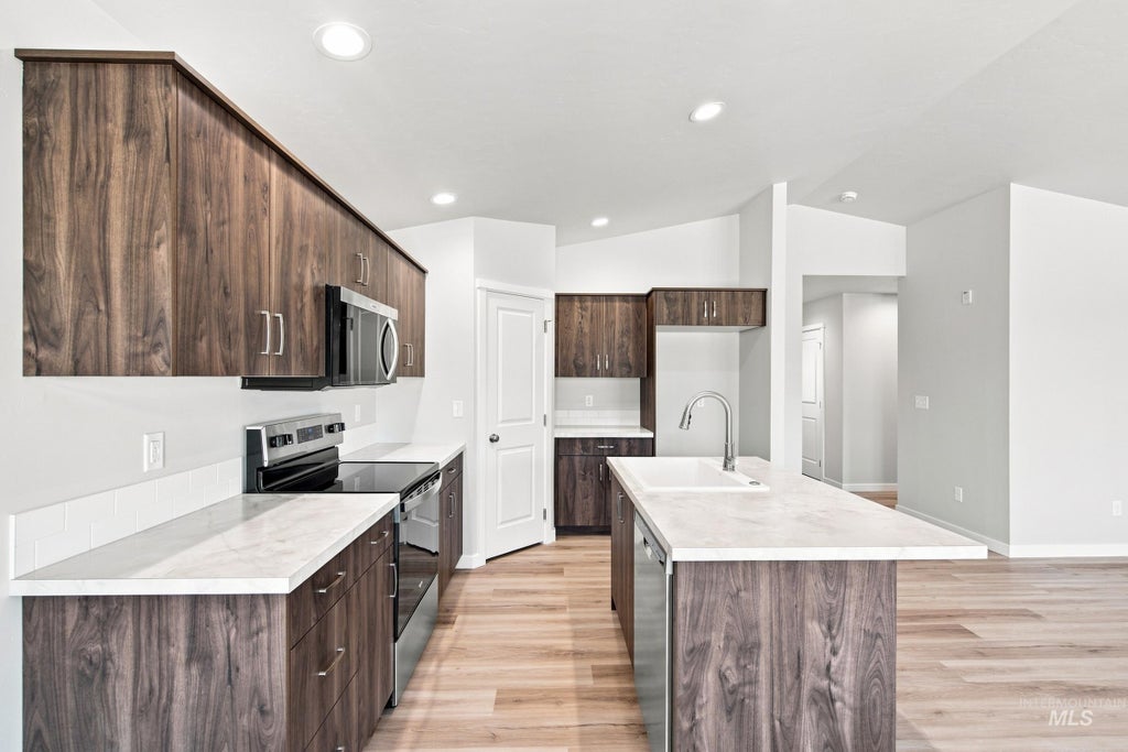 Photo of 171 N Tideberry Ave, Kuna, ID 83634 (MLS # 99000976)