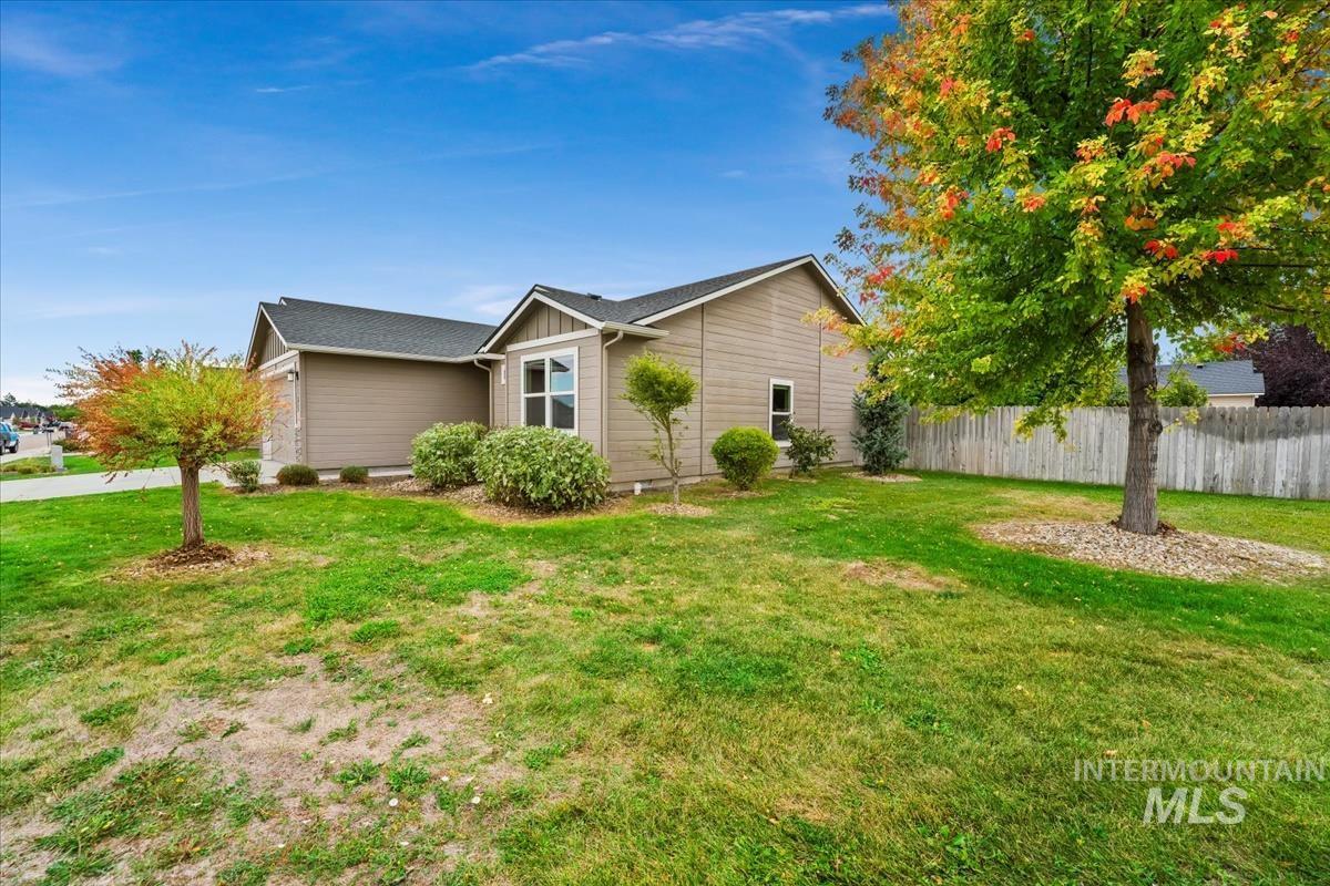 View of side of home featuring board and batten siding