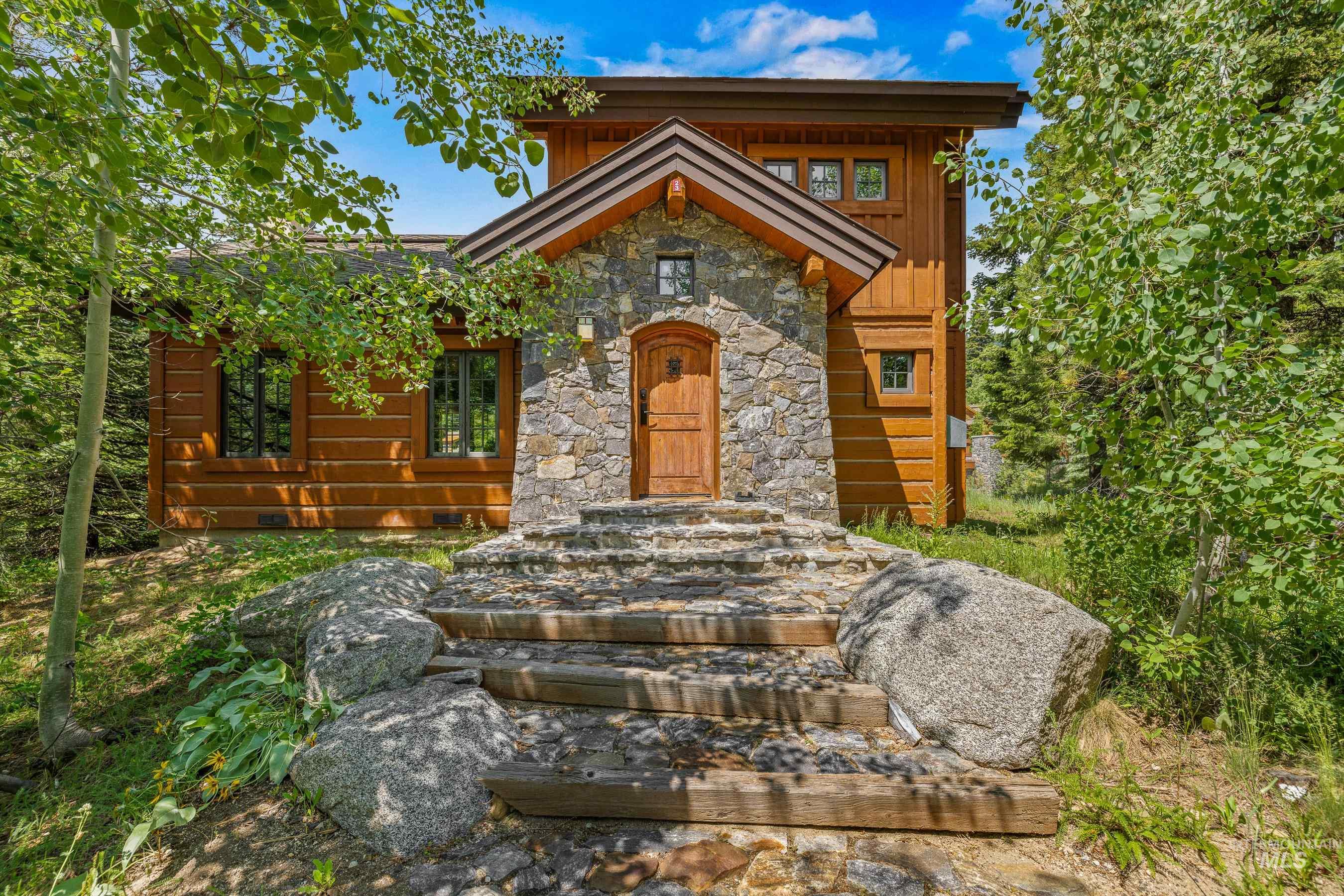View of front of home with stone siding