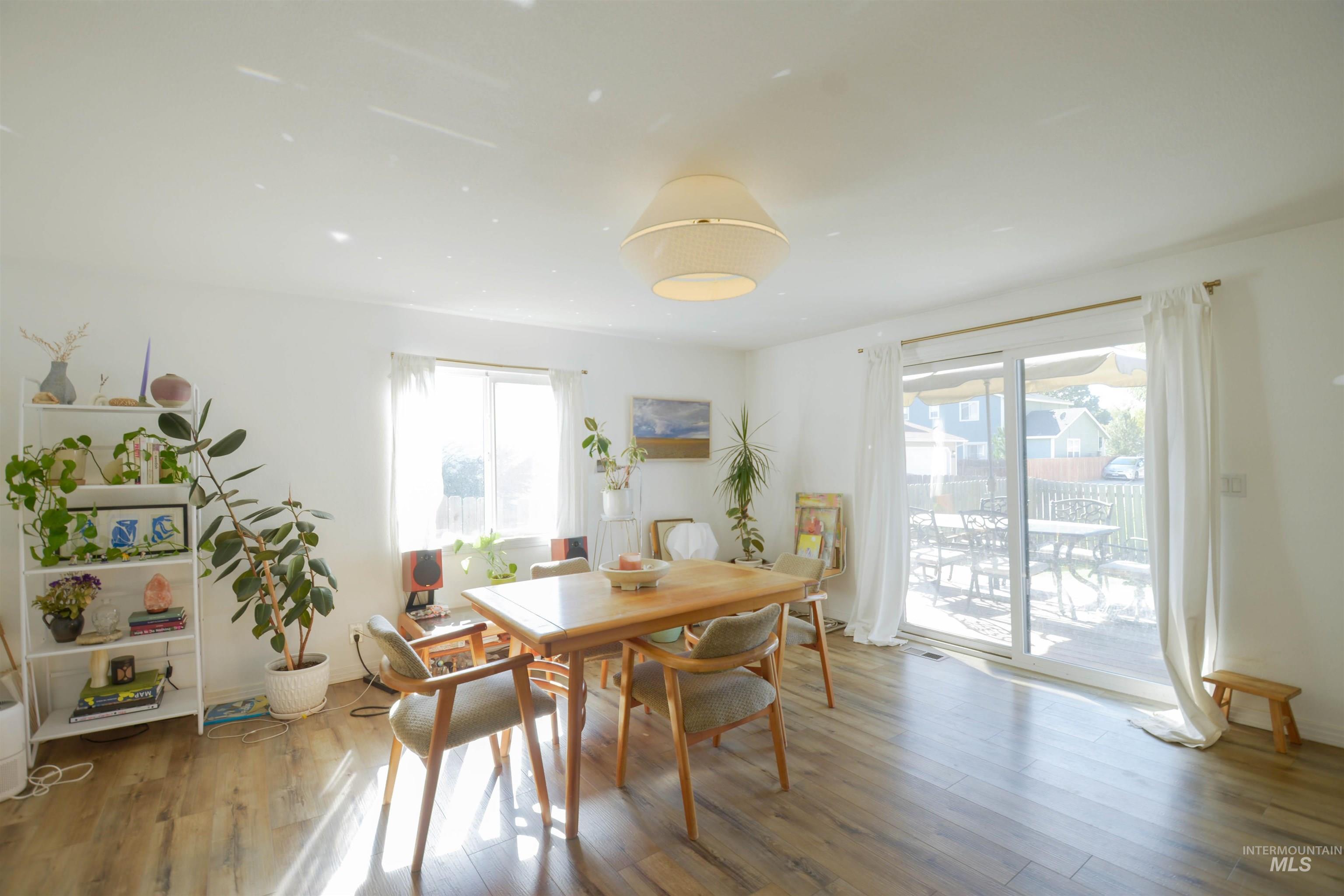 Dining area featuring light wood-type flooring