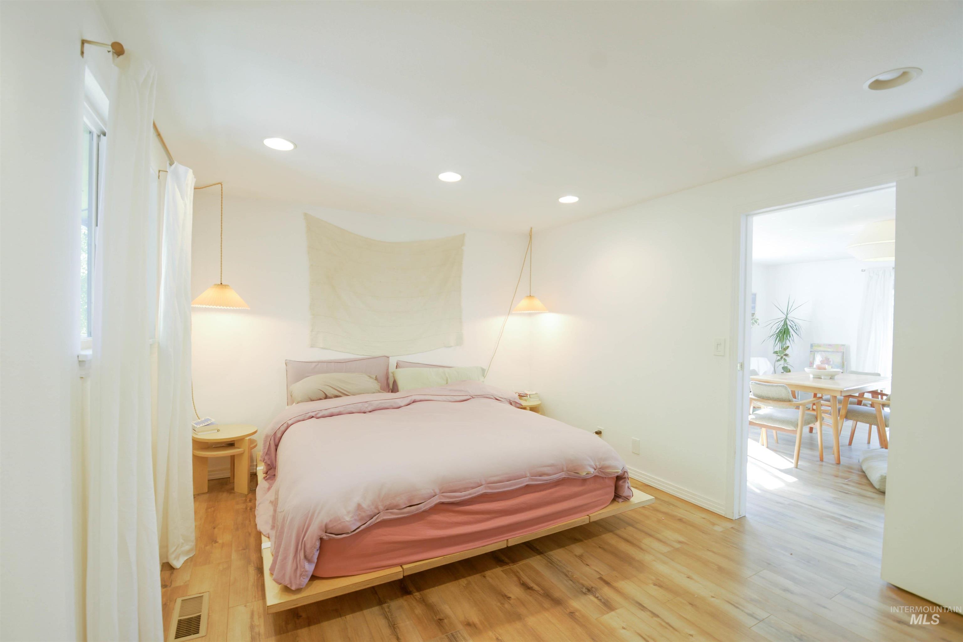 Bedroom featuring recessed lighting and light wood-style floors