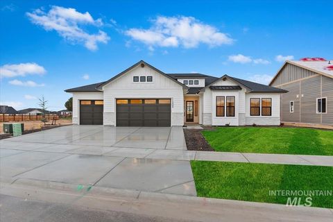Photo of 11303 S Cabot Cliffs Ln, Kuna, ID 83634 (MLS # 98969480)