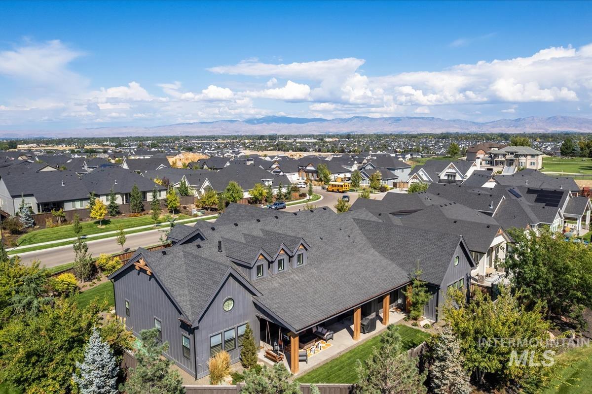 Aerial view of residential area with mountains