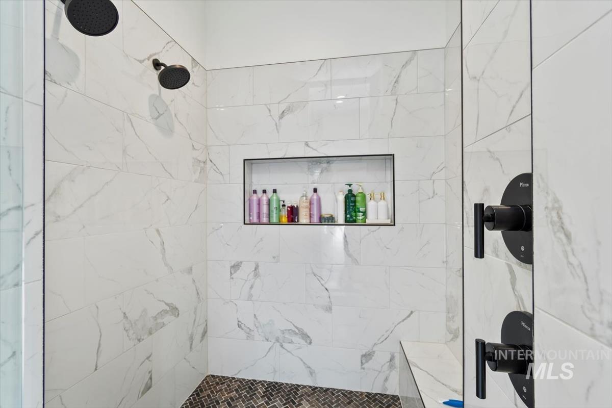 Bathroom with tiled shower