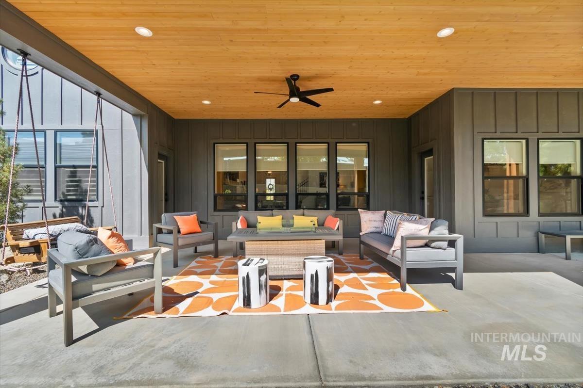 View of patio / terrace featuring an outdoor hangout area and a ceiling fan