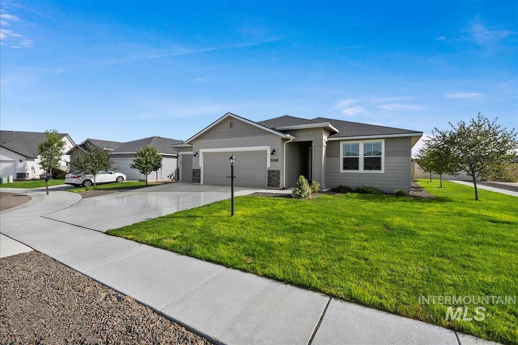 Photo of 11249 W Tualatin River St, Nampa, ID 83686 (MLS # 99000053)