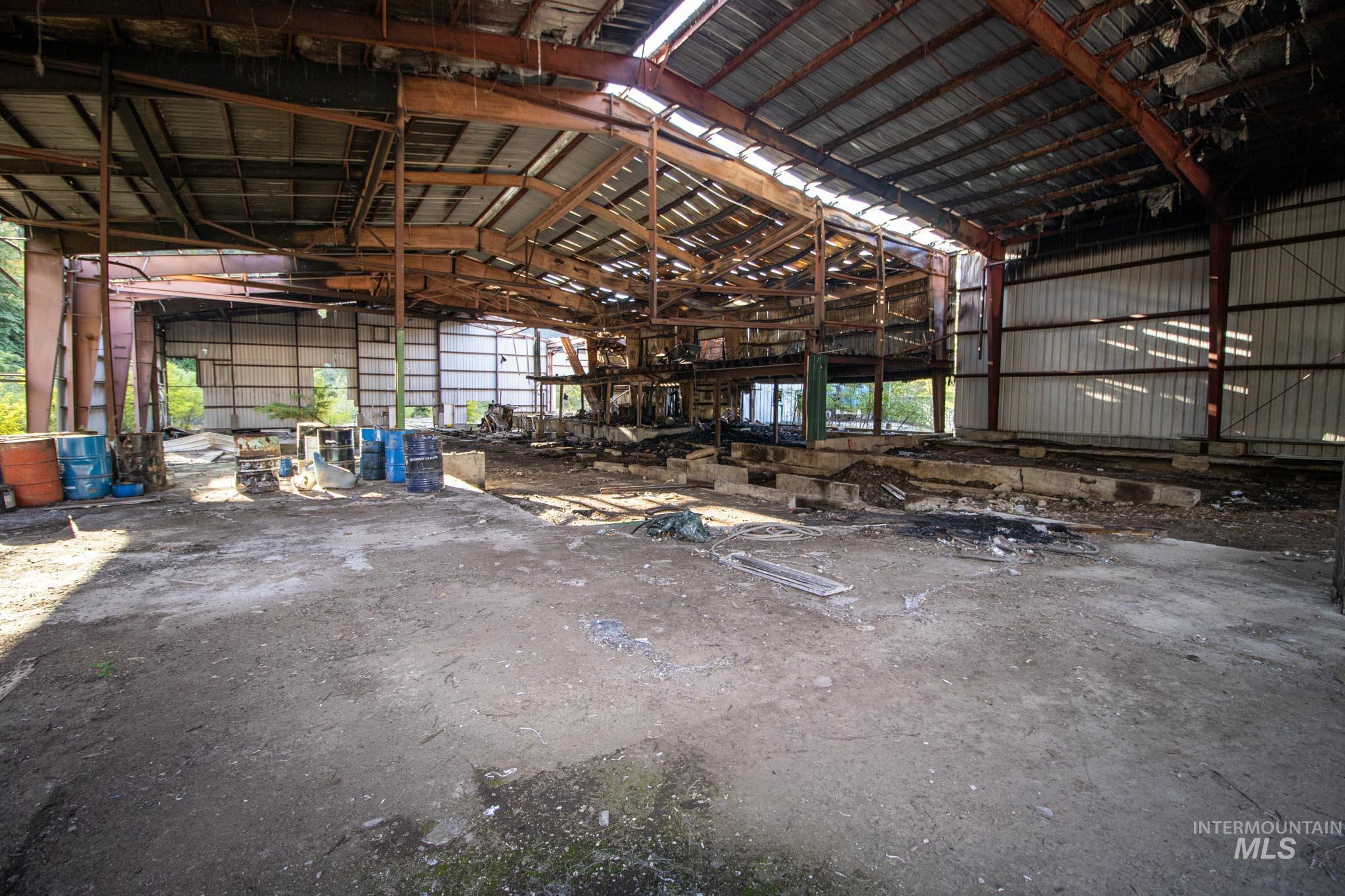Garage featuring metal wall