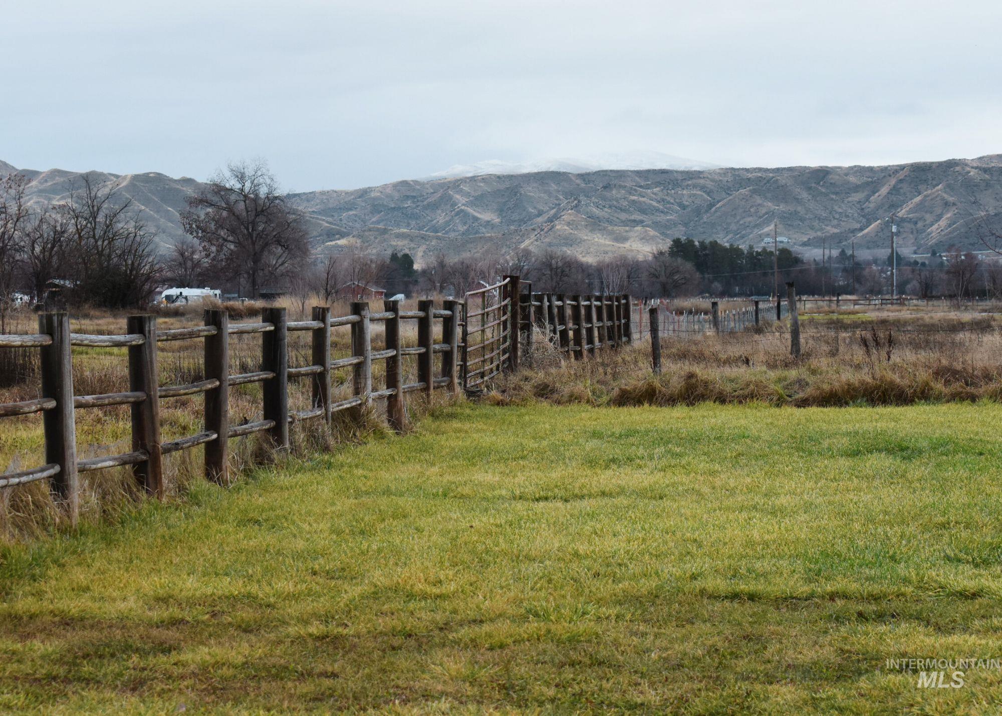 View of yard featuring a mountain view and a view of countryside