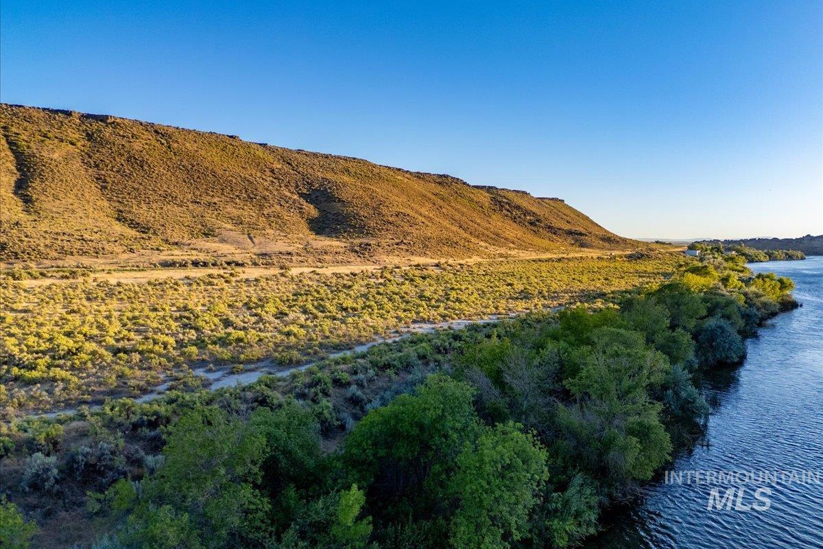 View of mountain backdrop with a large body of water