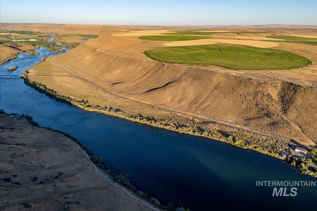 Bird's eye view of a nearby body of water and a golf club