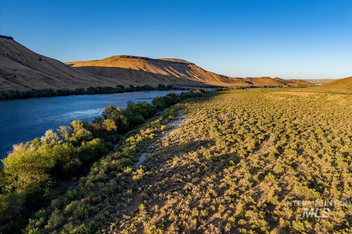 View of mountain background with a nearby body of water