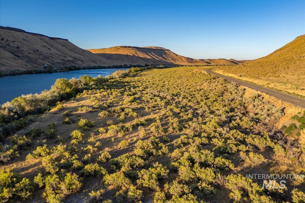 Mountain view featuring a large body of water