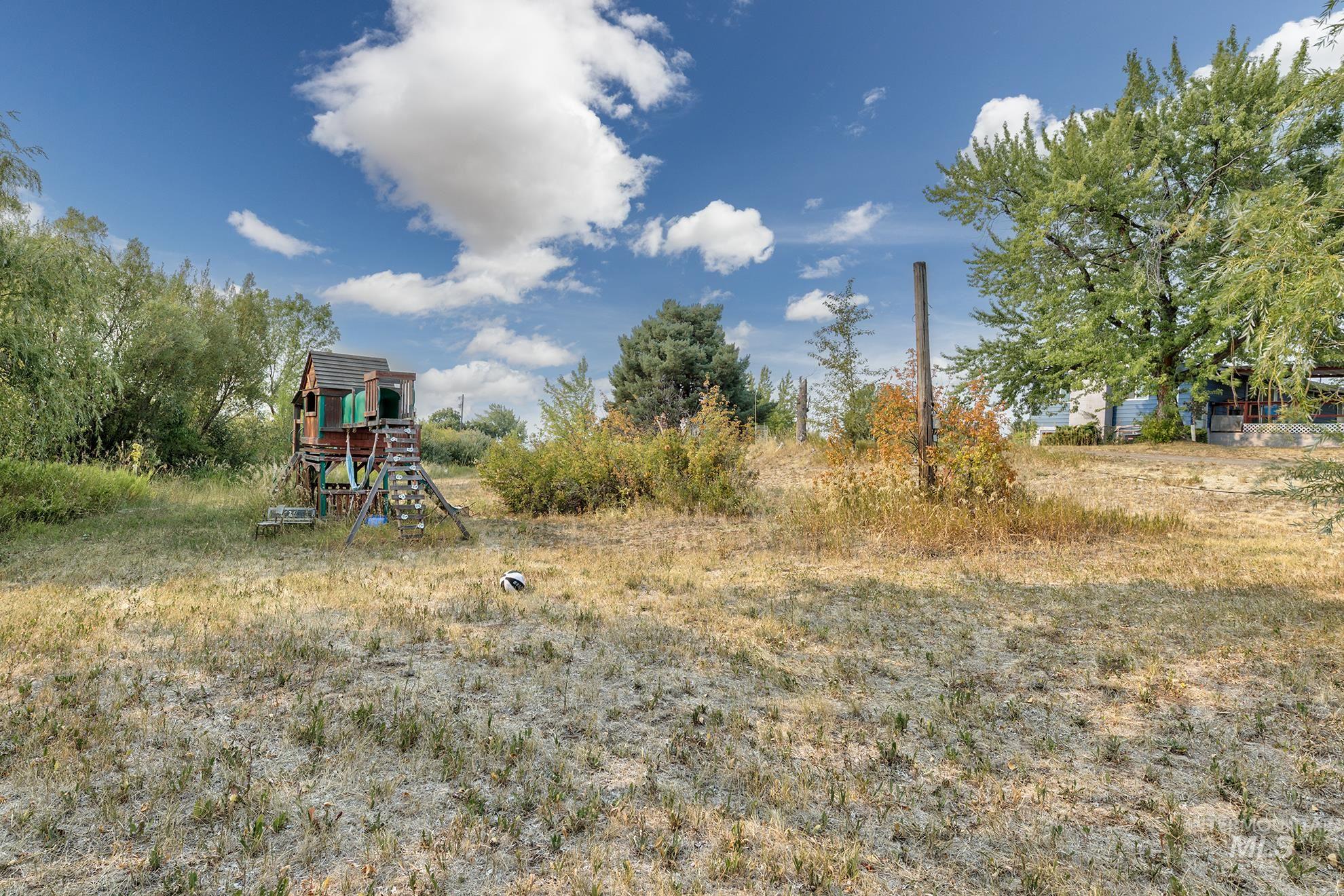 View of yard with a playground