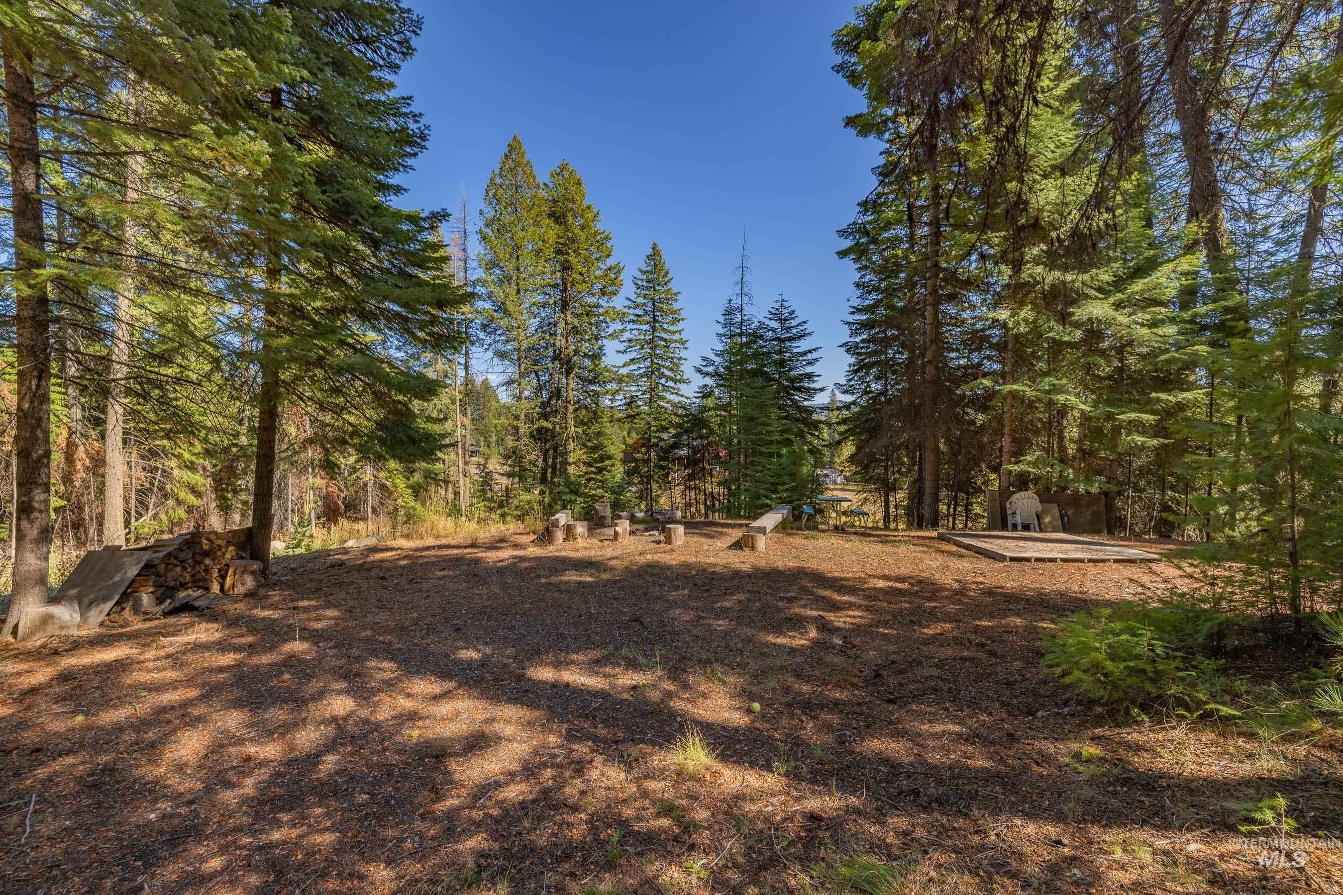 View of lot with a wooded view