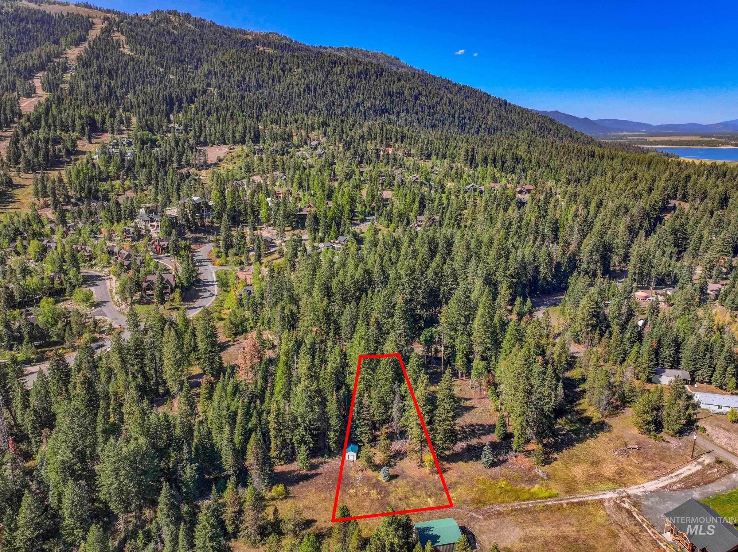 Aerial overview of property's location featuring property boundaries highlighted and Tamarack mountain view