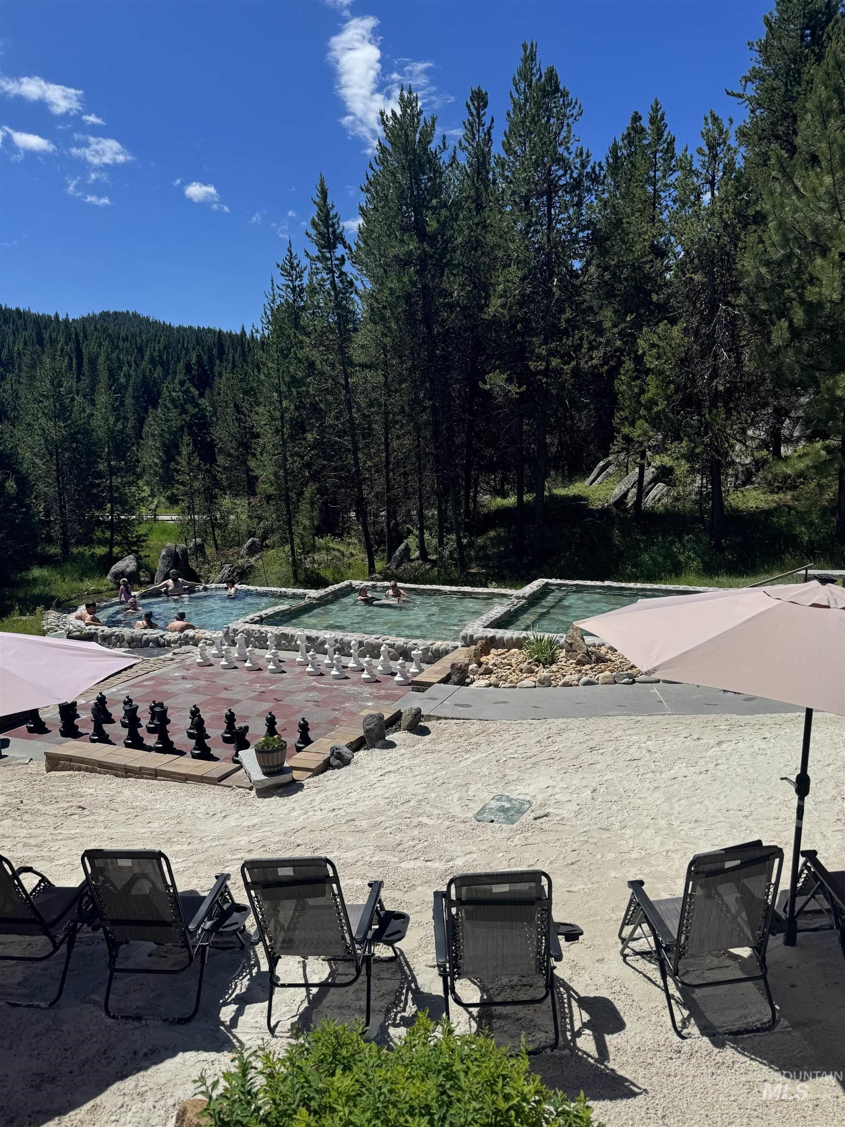 Multiple outdoor pools with rock edging