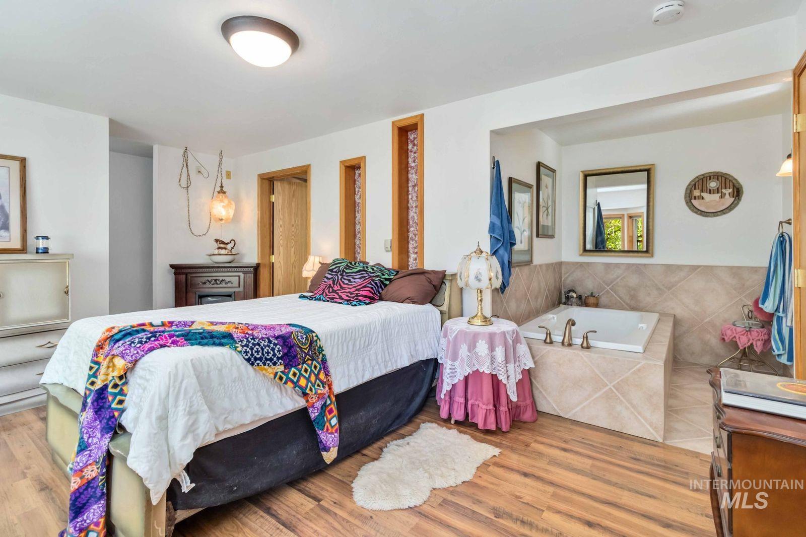 Bedroom featuring light wood-style floors