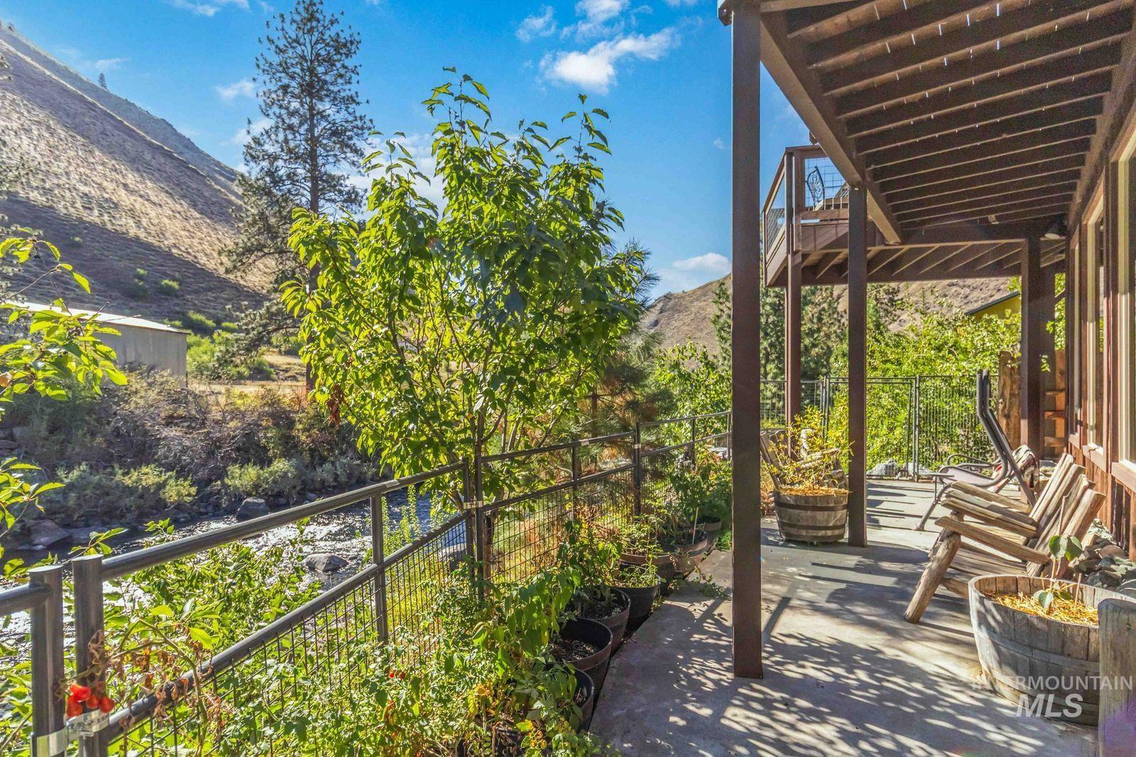 Patio / terrace featuring a mountain view