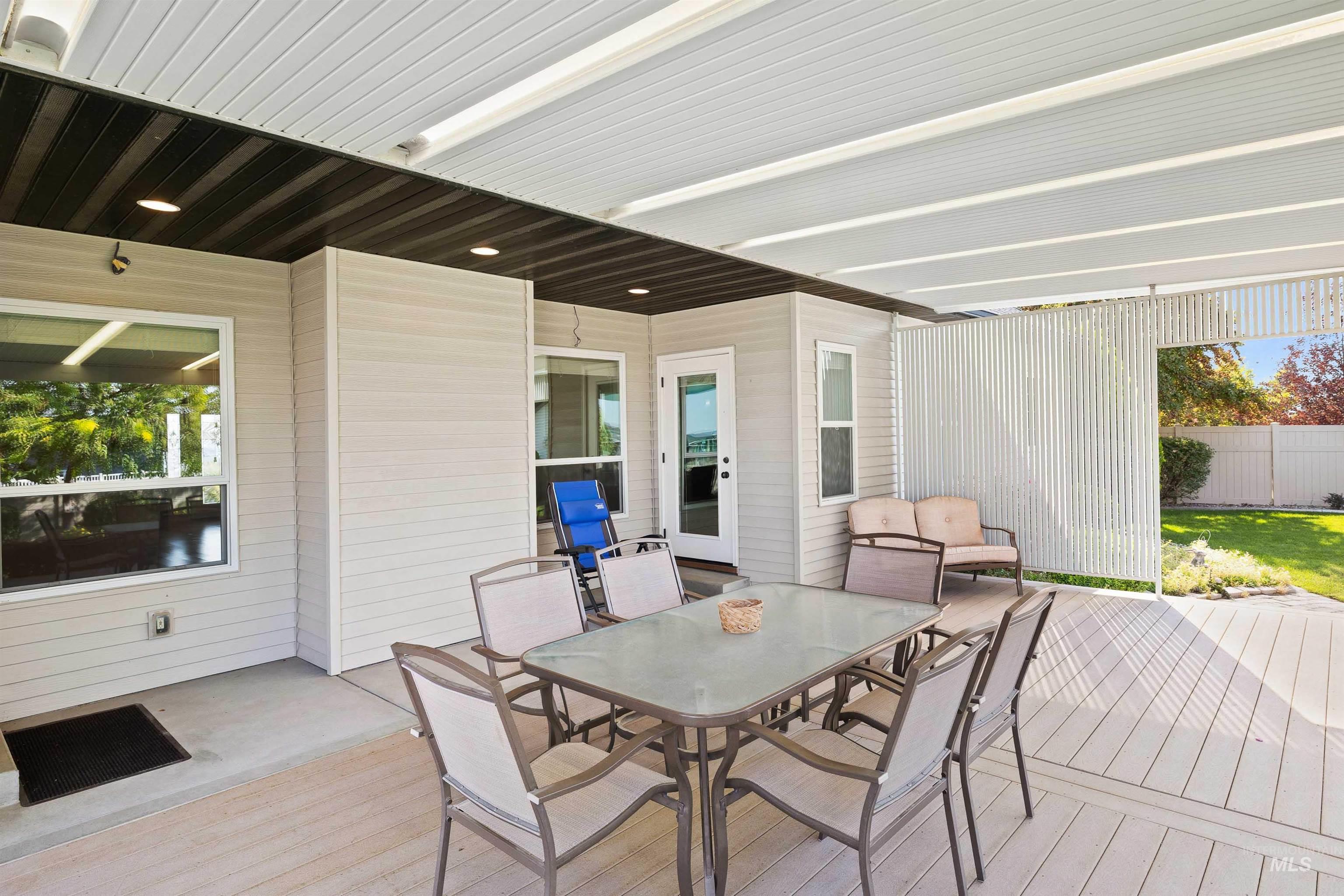 Wooden deck with outdoor dining area