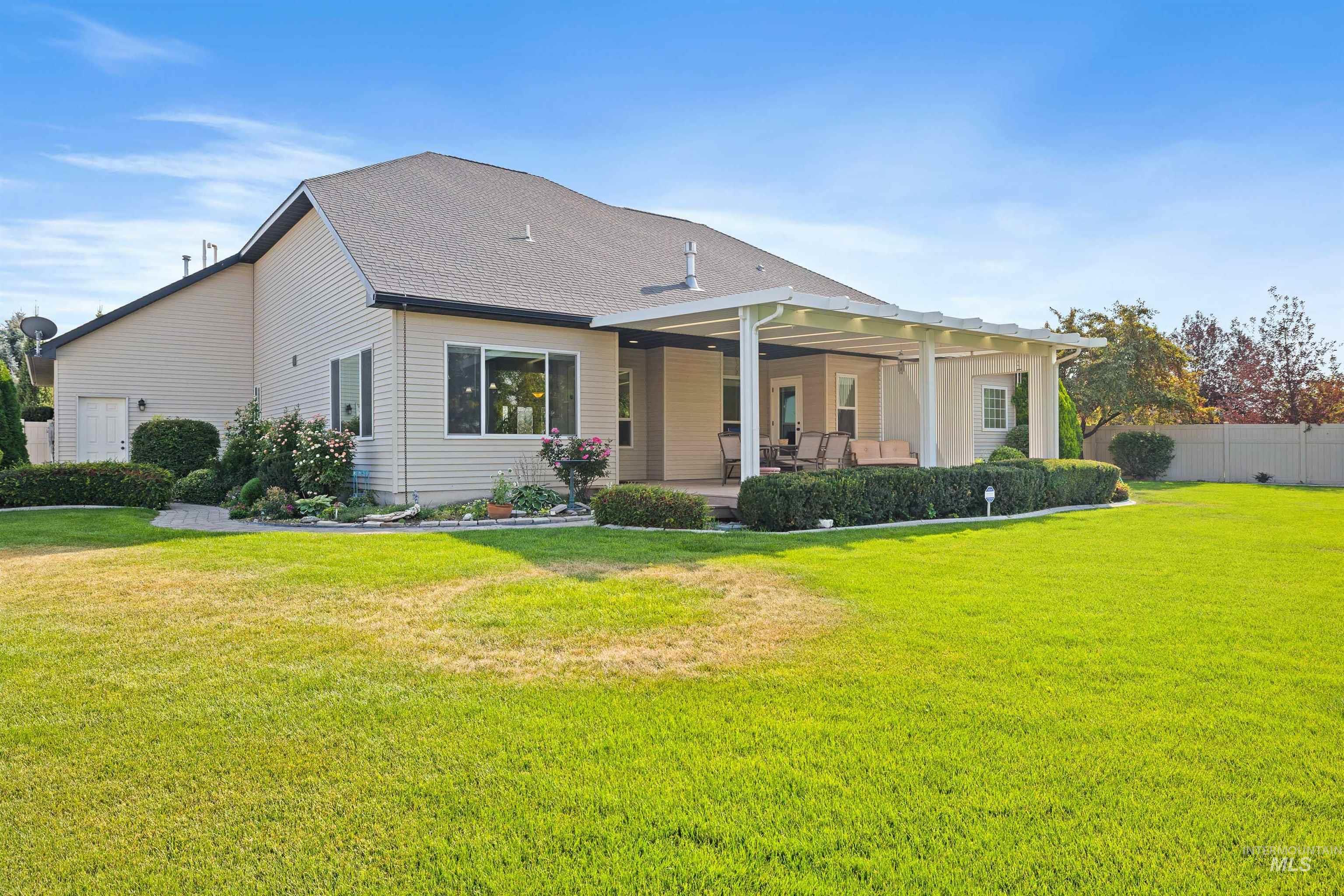 View of front of home with a shingled roof