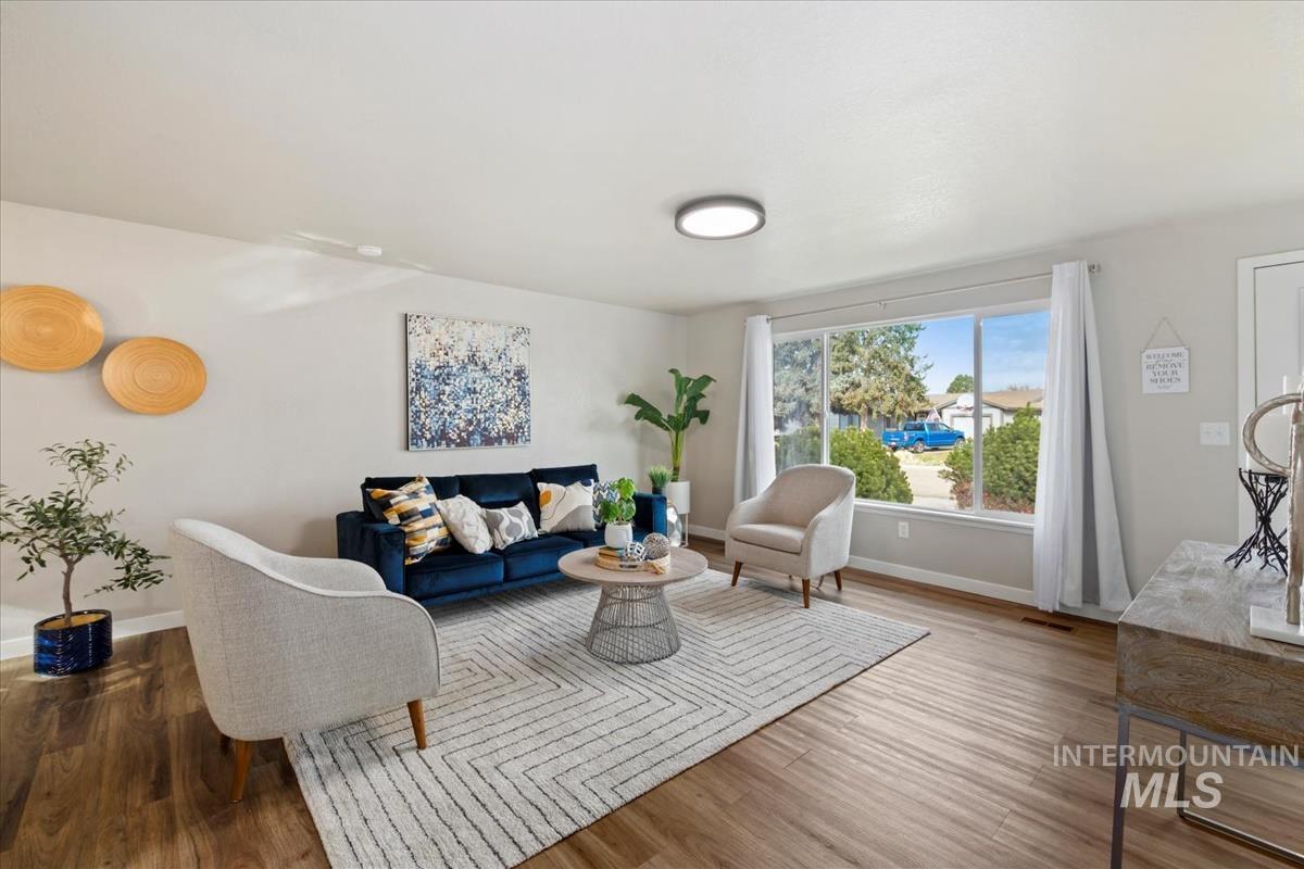 Living room featuring wood finished floors