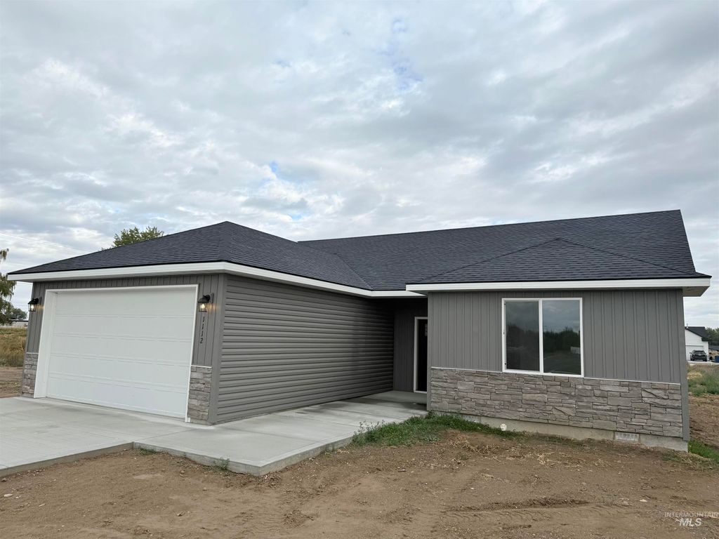 Photo of 1112 13th St, Rupert, ID 83350 (MLS # 98963879)