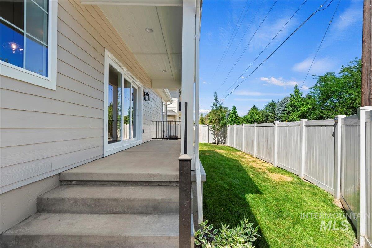 View of fenced backyard