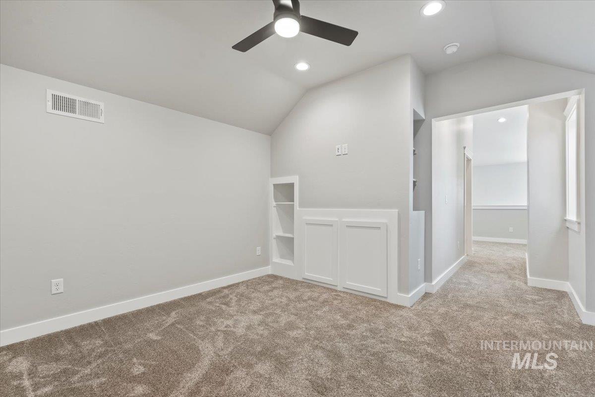 Bonus room featuring vaulted ceiling, ceiling fan, carpet flooring, and recessed lighting